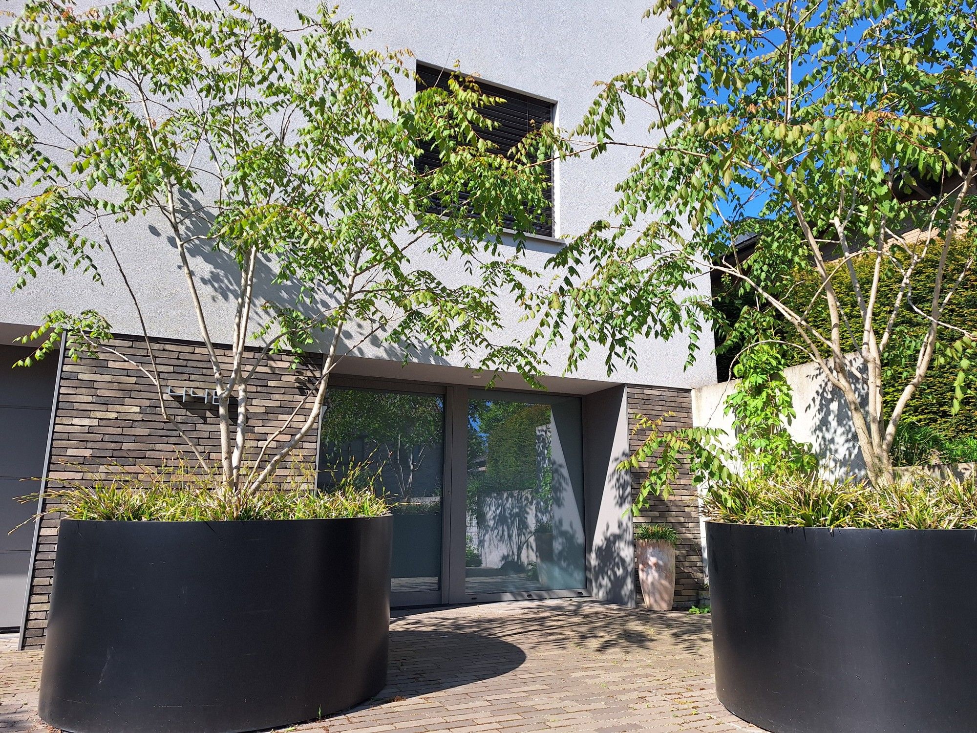 De kracht van materiaal en lijnenspel in tuinarchitectuur